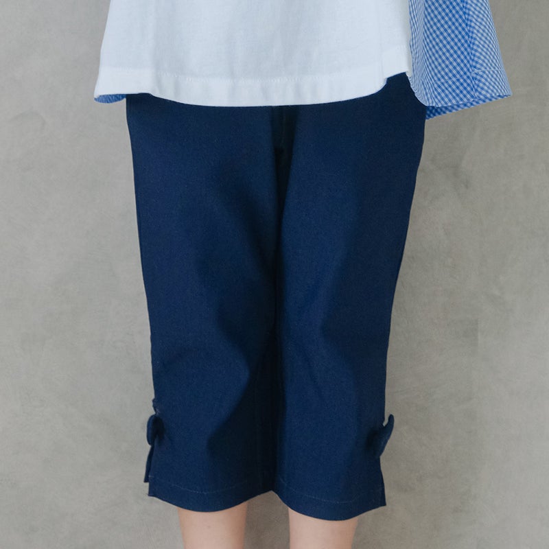 子供服 女の子 ストレッチツイル素材　リボンつき７分丈パンツ