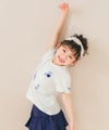 ベビー服 女の子 綿100％ リボン 音符柄 Tシャツ オフホワイト(11) モデル画像全身