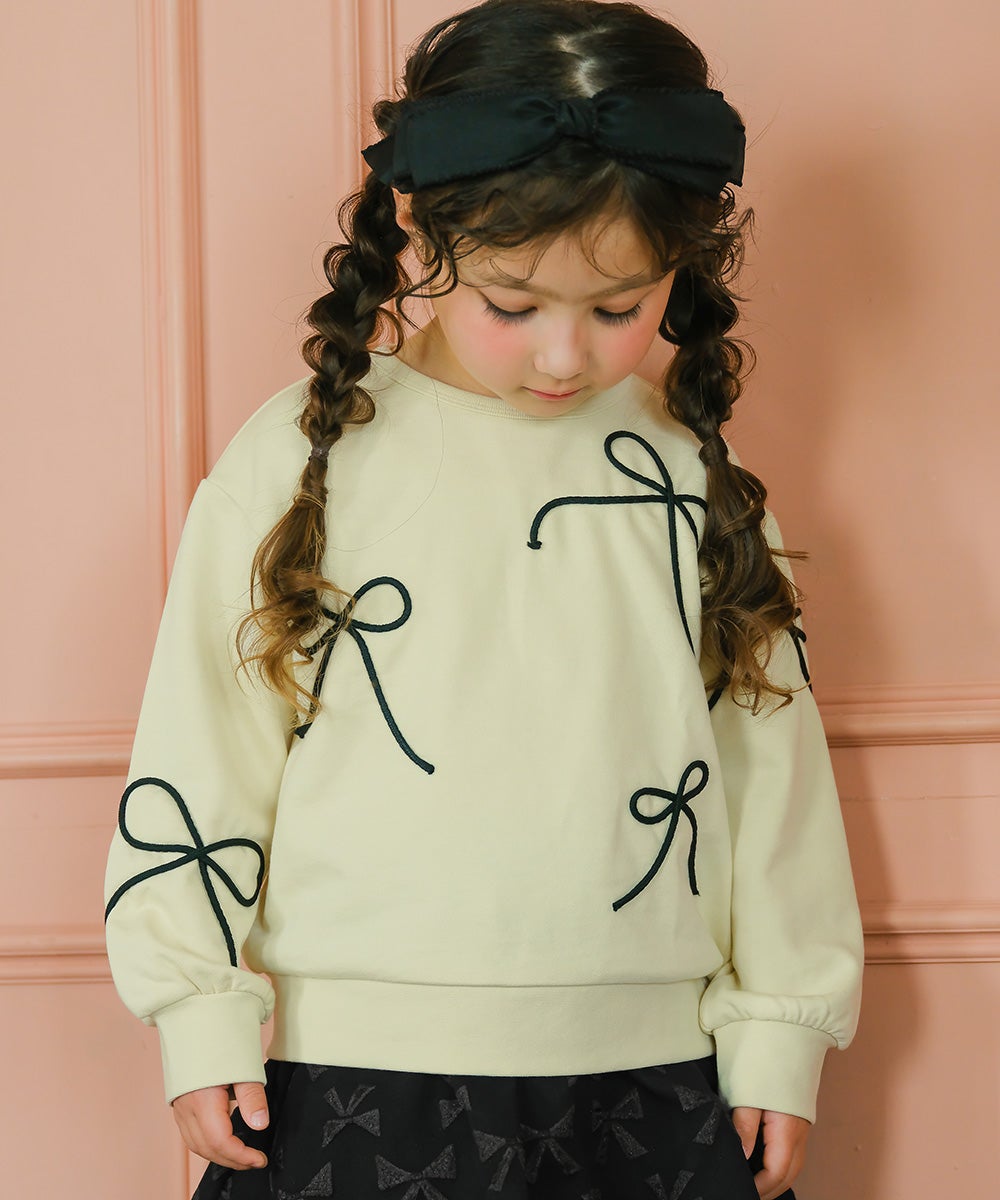 子供服 女の子 子ども服 こども キッズ ジュニア 長そで リボンモチーフつき アイボリー(12) モデル画像1